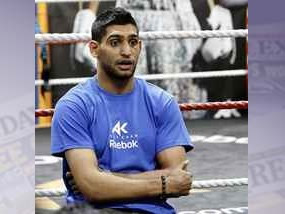 Khan reveals opponent